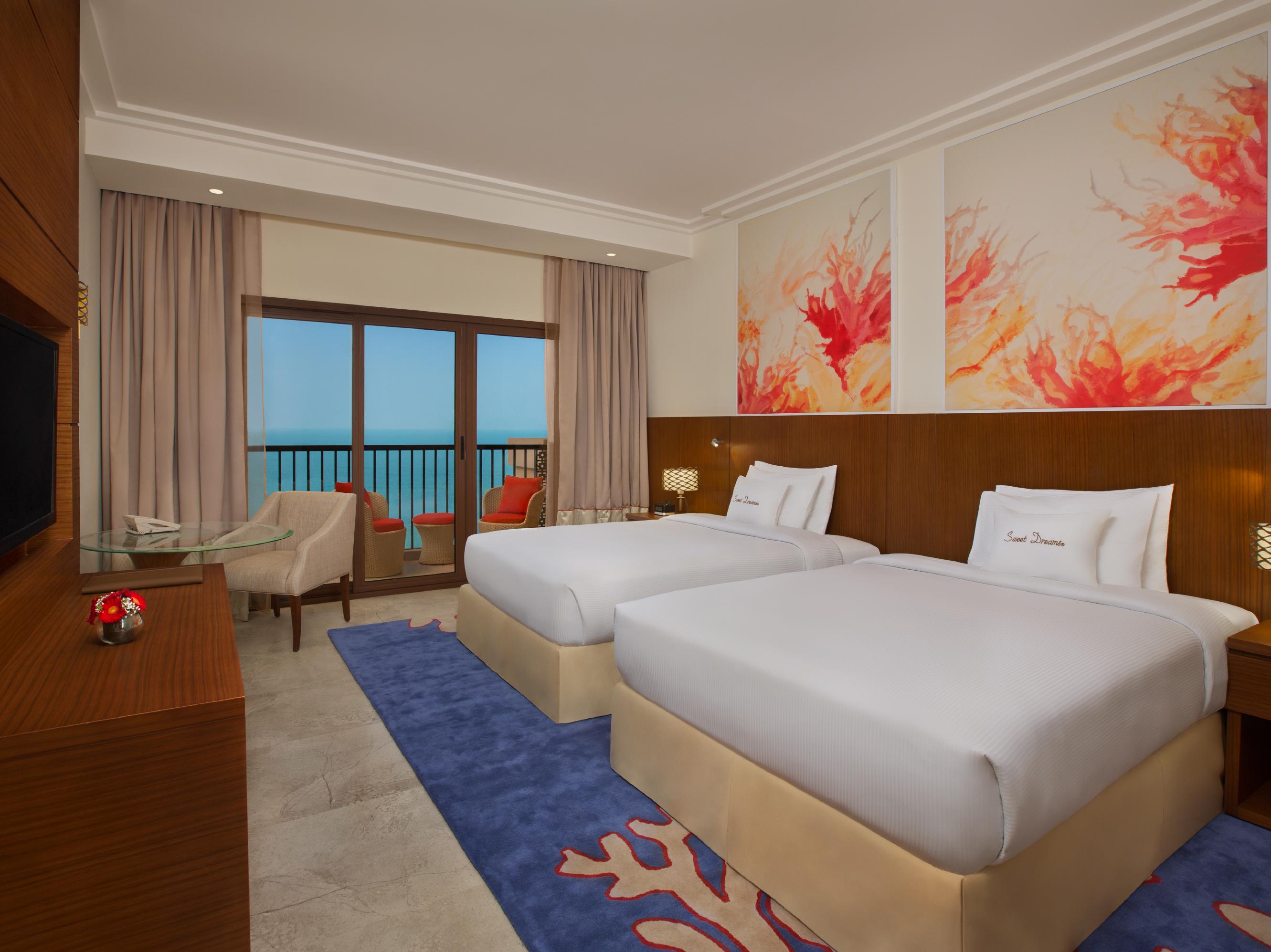 Twin Guest Room with Balcony and Sea View